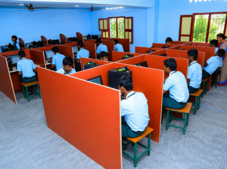 Wide view of the JMJ School computer laboratory