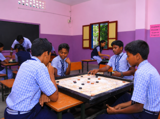 JMJ School students participating in an indoor game